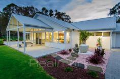  11 Mistover Place, YALLINGUP WA 6282 Discover this beautiful contemporary 4 x 2 family home located in the ever popular Yallingup Hills location. Surrounded by stunning wildlife in this natural rural precinct, this lovely home offers outstanding features, perfect for modern day family living. Only minutes to the surf at Yallingup & conveniently close to Dunsborough township, this lovely home is positioned on a North facing 1.83 acre property. Newly built, the home features a solar passive design with additional 5 zone fully ducted Fujitsu reverse cycle air conditioner. 