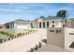  96 Allchin Circuit, Kambah, ACT 2902 Set on a magnificent elevated block of 950m2 and backing onto Mcquoids Hill nature reserve, lays this exquisite family home. Contemporary in its design and offering an abundance of space; 96 Allchin Circuit is the ideal abode for well-to-do families looking to enjoy a lifestyle of comfort. With a fixed term lease until December 2015 currently returning $875 per week, this is a great opportunity for those looking to secure a quality home now to move into down the track. Complete with all the quintessential features of a modern day home, it’s the extra thought in design and inclusions that will have you ‘mentally’ moved in as soon as you walk through the front door. 