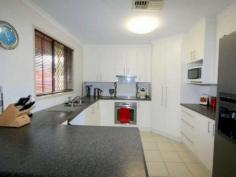5 Fysh St Emerald QLD 4720 Catch This One Quickly! If your an investor or looking for purchase a home, this Four Bedroom brick home, located close to Botanical Gardens, Denison State School, Coles Shopping Centre and near a Day Care centre, has it all right at your door step. Features: * 4 Spacious Bedrooms * Split Systems to all Rooms * Ensuite & WIR to Master bedroom * Modern Functional Kitchen * Open Airy Lounge Room * Spare Room suitable for an Office * Double Car Accommodation * Under Covered Entertainment Area * Fully Tiled Throughout * Fully Fenced, 700sqm block * Currently rented until June 2014 @ $400pw Make arrangements to see view this property today!   Property Snapshot Property Type: House Construction: Brick Veneer Zoning: SINGLE UNIT DWELLING Land Area: 700 m2 Features: Ensuite
