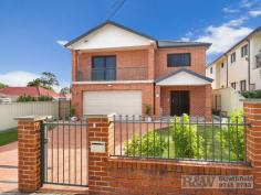 271 Homebush Rd Strathfield South NSW 2136 ARCHITECT DESIGNED RESIDENCE Solidly built full brick contemporary residence thoughtfully designed to provide multiple living space and enjoying an abundance of natural light. Features; Expansive lounge, family and dining area Showpiece Blum kitchen with top quality Caesar stone benches and appliances Impressive feature ceilings with remote control lighting Oversized bedrooms upstairs, all with pleasant outlook Master bedroom with walk-in robe, en-suite and balcony Ducted air-conditioning and hardwood flooring Sunny backyard and large covered alfresco dining area Double garage, security alarm & CCTV system A convenient location for city transport and local best schools. 