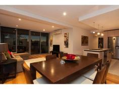  21/155 Adelaide Terrace East Perth WA 6004 TWILIGHT OPEN, 5.30 -6pm, Wed, 24th PRICE SLASHED! LAST CHANCE or OWNER WILL LEASE! Stunningly situated on Level 10 of the ultra-modern “Rise” complex, this immaculate two-bedroom two-bathroom apartment defines easy inner-city living and enjoys peace, tranquility and security whilst boasting breathtaking river and city views from a massive wrap around 40sqm balcony and within. Polished Blackbutt timber floorboards lend a low-maintenance feel throughout the home and creates a smooth flow, linking the sleeping wing to the open-plan living and dining area where a spacious kitchen is incorporated into the airy design. The main living zone and both bedrooms each have their own individually-controlled split-system air-conditioners, including a sumptuous master ensemble with mirrored built-in wardrobes, access out on to the balcony for entertaining and a private and stylish ensuite bathroom with a shower, toilet and twin stone vanities. The Guest bathroom-come-laundry services guests and the Guest bedroom that also provides balcony access, whilst the kitchen is luxuriously-equipped with a sparkling stone island bench top, quality glass splashbacks, a Bosch electric cook top, oven, exhaust and a Miele dishwasher. Absorb the sun glistening or the night city lights reflecting on our picturesque Swan River and choose to either nest or invest in this East Perth gem, just footsteps from convenience stores, cafes, Langley Park and more. With free buses along St George’s Terrace, this is your gateway to our vibrant CBD! Other features include: • 2 bedrooms, 2 bathrooms * Level 10 * Very generous 89sqm of internal living with separate sleeping wing • Shower, toilet, twin stone vanities and laundry appliances in Guest bathroom • L-shaped alfresco balcony for entertaining and quiet contemplation whilst indulging in mesmerising views of our beautiful Swan River and its city surrounds • Audio intercom system, secure lift access from Grand Lobby entrance • Feature down lighting • Quality blind fittings throughout • Shadow line cornices • Moments from Perth train station, free city CAT buses, cafes, restaurants and shopping * Resort facilities include a resident’s lounge/function room, a shimmering infinity-style lap swimming pool, sauna, spa and gym – and there is also one secure car parking bay plus storage available. * Anticipated Rental Return $750 per week Invest in the East Perth precinct now before more than $3.5 billion worth of infrastructure is completed, including the new Waterbank project located only two blocks from 175 Hay Street, as well as the new Perth City Link, Elizabeth Quay, Perth Light Rail System (MAX), the new Pedestrian Bridge pass to Crown Casino and much more OUTGOINGS: Water Raters: $1,155 per annum Council Rates: $1,502 per annum Call Melissa Green on 0437 702 708 today to arrange your viewing Area: 90 Sqrs Land:: 144 Sqms Features larger balcony • ample storage • polished floorboards • 3x AC units • Ensuite • Outside Spa • Remote Garage • Swimming/Lap Pool • Intercom • Gym • Polished Timber Floors • Dishwasher • Courtyard • Built-ins • Balcony • Air Conditioning •  
