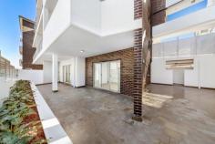   14/100 Tennyson Road Mortlake NSW 2137 Luxuriously set in a stunning brand new boutique security development & spanning over a huge total area of approximately 281m2 is this enormous courtyard apartment finished to perfection with high quality fittings offering the ultimate lifestyle, situated just moments from the waters edge & the areas vibrant cafes/eateries. * 3 spacious bedrooms, main with walk in robe & ensuite, built ins, large open plan lounge & dining, high ceilings, ducted air con * Quality CaesarStone gas kitchen with Miele stainless steel appliances, dishwasher & breakfast bar, 2 stunning bathrooms * 2 huge sundrenched entertainers courtyards, double security parking, lift access, video intercom * Short walk to waterways, transport, shopping village, cafes & restaurants 