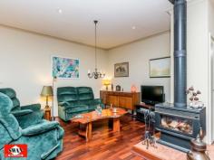  23 Walden Close Gidgegannup WA 6083 Inspections Inspections by appointment only. This rural and much sought after village on the edge of metropolitan Perth, has many superb life styles to offer. This 6.2 acre property would have to be classified as your own piece of paradise, secluded and far away from the maddening crowd with the hustle bustle of the city. It borders other large properties with one great neighbour, Please allow me to give you a little tour, starting with pines and an electric gate/intercom, a welcoming feature on wet and windy days. The 150 metre trees and shrubs lined driveway brings you to a large parking area, a double car port and double shaded parking. A lovely elevated home, flanked by bush further compliments this great setting. The pond, the sound of 3 waterfalls, lush green rockery and a backdrop of unique and unusual panels, gives the outdoor entertaining area a special feel. Open living with 180 degrees views over a native garden, bushes and trees that seem to ramble on into the distance over this gently sloping property. The split kitchen is a cook’s dream where dirty dishes and evidence of a great meal are hidden from view by a low curved feature wall. It also features a new gas cook top, electric oven. The property boasts a large master bedroom with private ensuite and walk-in-robe as well as a large double guest bedroom and a smaller double bedroom both with built-in-robes. There is also a office/single bedroom overlooking this amazing property. The main bathroom is large and is beautifully presented with a spa/shower and toilet. The pristine jarrah flooring flows through the home and along an extra wide passage way with bookcase. The high ceilings, tinted windows throughout and the cosy wood fire resonate the perfect setting to unwind and enjoy the stunning views from this beautiful property whilst reading, relaxing with family or entertaining. A solar hot water system with gas booster and a solar tracker run endless hot water to the property using the sun hitting the large roof span to reduce your electricity costs. Outside the property features a wrap-around verandah for relaxing and taking in the breathtaking sunsets. The property is also fire ready with permanent gutter guard, 24m span large sprinklers, extra-large electric cable, firefighting pump and hose and 12000L and 150000L water tanks. Hundreds of graceful grass trees (black boys) some ancient surround the home, together with the many shrubs and trees that make this property lush and green all year round. A small path meanders through the bush to a netted vegetable garden, 2 open patches and a 6m x 3m potting shed with electricity. Next to this is a 12000L water tank fed by a 600 gallon an hour bore for watering with a new pump. Currently three quarters of the property is reticulated with automated sprinklers and a float switch regulates the water level. There is another 6m x 3m workshop also with electricity, a work bench and shelving on both sides for storage. Then there is a 6m x 3m ventilated storage shed. Just down a slope your eye will catch citrus and exotic fruit trees as well as 2 almonds, and a pecan tree, all artistically netted and weed protected by a weed matt and top dressed with very fine gravel. Further down a chicken coop, enclosed to make it fox proof and house on stilts, with easy access to eggs. This is part of a larger open enclosure, ideal for geese, ducks, goats etc. A circular driveway leads to steps and a 150.000 Lt. rain-water tank that sits on the other side of the house together with more netted exotic fruit like, Jube-Jube , Persimmon, Pawpaw, Pomegranate and another Shartoot all hidden from view. Jezzabelle the pet kangaroo was brought up in the house and considers this her home. She will delight you when she comes to feed with her current joey. Wild ones will come down in the hot summer to feed at the kangaroo patch just below the house which is kept green with two large sprinklers. There are several great secluded spots to sit with a book overlooking a dam across the bridle path or you might enjoy the green rolling pastures across the fire break. Close to the house is a great spot for a fixture or an umbrella and some chairs, marvelling at the lovely view, bush orchids and wild flowers. This area is ideal for entertaining with friends or family. There is ample room for a pool or to keep animals. The local schools at Mt Helena are only a few kilometres away and there is a bus stop 100 metres from the front gate of the property. • If you are ready to make the tree change and looking for seclusion and nature at its best, waking up to the sound of kookaburra’s.  • If you marvel at the sight of an eagle soaring high in a clear blue sky or watch a flock of red tailed cockatoo’s resting in their favourite tree.  • If you like to be surprised by a bobtail wondering past or like to surprise a sleeping sun drenched goanna on the driveway.  • If you like to spot an unsuspecting bandicoot or get excited by a heron, gingerly negotiating rocks to snatch a fish from the pond.  • If you enjoy watching galas, twenty eights and magpies or beautiful bright blue wrens all vying for position at the feeder just outside the window.  THEN THIS CAN ALL BE YOUR INSTANT PRIDE AND JOY. The owners have lovingly spent many years of dedication to this once virgin piece of land which has so much to offer that no photo or description would do justice to the magic that surrounds you here. 