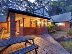  8-10 Wolfes Road Neika TAS 7054 This substantial residence is on approximately one hectare of land with 2 titles. With spring water and enjoying lovely views to Bruny Island and South Arm and their surrounding water ways, it's hard to believe that this gem is found only 15 minutes from Hobart and 10 minutes from Kingston. Inside are multiple living areas over two levels with 2.5 bathrooms, 4 bedrooms and a study. The spacious master suite enjoys a private balcony with a Gothic Tudor themed arch affording breathtaking views and privacy. The en-suite and dressing room are set aside and are located down a private stairwell leading from this bedroom. 