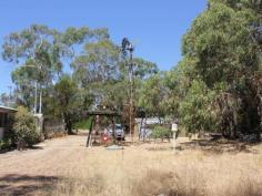  11 Caponi Rd Barragup WA 6209 Drive up the picturesque drive of the fully fenced property towards the 
old Fibro home, set only metres from the river. This 4.96ha sub 
dividable rural block can be split into two. You can keep one and sell 
the other. Power and scheme water are connected to the property. Build
 your dream home away from it all but only minutes from Mandurah's 
Coffee Strip, Shops, Schools, Transport, Spud Shed & Freeway. Call Ian Lay today 0407 479 747 to arrange your viewing.
 