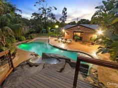  906 Pacific Hwy Berowra NSW 2081 Huge Level Land with Resort Style Home! A One of a Kind Surprise Package! Positioned in a tranquil & unique setting, well away from the highway on a private road, this once in a lifetime opportunity exits for an astute buyer to create their own oasis with the added bonus of running a home business.  Features include:  Lush tropical established gardens  Large level land - 2426sqm  Private road - secluded location  Spacious living & entertaining areas  Separate home office & workshop  Gas heating for Resort sized pool with rock feature & water slide  Gourmet kitchen - European appliances including steamer oven  Built in coffee machine  In ground watering system for gardens  Lighting in garden and pool Area  Front garden with fish pond, bridge and a creek.  Storage area at rear of shed  2 Bird aviaries, billiard table.  Children's play equipment  Inclusions: TV's and home theatre, indoor and outdoor speakers,  Built in coffee machine, children's play equipment, trampoline  About the local area:  Train station, Berowra Waters (restaurants, boat ramp, marina, access to waterways), Brooklyn, bush walks, short drive to central coast beaches & northern beaches, on/off ramps to M1, community village, schools and sports surrounded by National Parks  