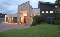  8-10 Kambah Pl Reedy Creek QLD 4227 STYLE FOR HARMONIOUS INDOOR/ OUTDOOR LIVING $999,000 Web property id:  CBS583 Elevated within the heart of ‘The Observatory’, this master built Sanctuary 28 residence presents two levels of contemporary living appointed to the highest standards. Enjoy the peaceful park surroundings.  • Beautiful formal lounge/dining area has spotted gum floors • Entertaining area enjoys a sparkling pool outdoor shower and park views • Caesar Stone bench tops, kitchen equipped with Smeg appliances • Family bedroom wing enjoys a stylishly appointed bathroom • Top floor main has an opulant ensuite and a large deck overlooking Surfers Skyline views.  • Sounproof hobby/rumpus room plus an Italian tiled family living area • Air conditioned, Vacuum Maid, intercom and surround sound • Toowoomba sandstone paving plus landscaped gardens and lawn • Triple car garaging, plus extra space for a van/boat • Set on a 1,143sqm block opposite parklands Located within minutes drive to private and public schools, public transport, Varsity Train Station ,Local Shopping Centre and 20 mins to Burleigh Beach. 