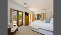  26a Coronation Avenue, Mosman, NSW 2088 Balmoral Beach Retreat - Resort-Style Gardens Reminiscent of a luxurious tropical resort, this incredibly private family retreat is tucked away in a secluded enclave overlooking idyllic Balmoral Oval. Created with a focus on alfresco living with all principal rooms opening outdoors, it has been designed to embrace a lush north facing garden oasis with heated pool and entertainer's cabana. It enjoys a tightly held dress circle setting on the Balmoral Slopes, just a short stroll to the beach, harbourfront dining and parkland.  - Designed by award-winning firm Harrington Architects - Auto gated driveway access with video intercom security - 4 beds with built-ins, deluxe Saturnia stone baths - Private master suite with study, dressing room & terrace - Huge living room & formal dining room, Jetmaster fireplace - Sun drenched casual living wrapped in garden terraces  - Gourmet granite gas kitchen overlooking the sparkling pool - Internal access to a double garage, gym, ducted air - Chic guest powder room, huge hidden laundry/utilities room  