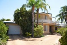  34 Golf Rd Merredin WA 6415 DOUBLE STOREY MASTERPIECE This craftsmen built home would be close to the best double storey in town and needs to be viewed to be appreciated. Absolutely perfect location with views from the balcony facing town overlooking the Golf Course and Merredin Recreation Centre. Ideal for a professional family or a retiring farmer looking for an town base. Spacious living areas and large kitchen plus formal lounge room. Master bedroom with ensuite and walk in robe. Built in robes to two other bedrooms. Reverse cycle split A/C to lounge plus ducted evaporative A/C cools from upstairs. Enclosed entertaining patio overlooks below ground swimming pool. Double length side carport UMR and double roller door garage at rear. Instant gas HWS. Neat garden and yards on well fenced 1033m2 block. Owner is on the move and priced to sell, please contact exclusive selling agents Elders Real Estate to arrange your inspection - Will Morris 0448 415 537 Other features: Built-In Wardrobes,Close to Schools,Close to Shops,Close to Transport,Garden 