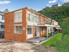  2/145 Avoca Drive Avoca Beach NSW 2251 BEACHSIDE HIDEAWAY - 20 metres FROM THE SAND This well cared for and tightly held ground floor unit is in a prime position to accommodate your beachside holiday or weekend away. The fact that it's never been rented or let means it's remained in excellent condition. In addition its favourable position also makes the property an ideal year round investment. Featuring polished timber floors, open plan living incorporating lounge and dining areas, with neat sizeable kitchen, BIRs in both bedrooms, tidy bathroom plus a handy secure parking space, while the front porch is your box seat to watching the waves roll in and lap at the beach which is a mere moment away. In fact there is less than 20m from your front door to the glorious sands of Avoca beach, and an easy 5 minute stroll will have you between the flags or at the beachside cafes and surf club, and in the other direction local shops and restaurants are just 2 minutes away. General Features Property Type: Unit Bedrooms: 2 Bathrooms: 1 Outdoor Features Carport Spaces: 1 Other Features Oceanviews, Polished Timber Floors 