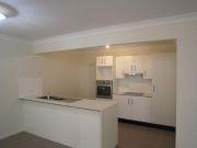  2/12 Prewett Street Upper Coomera Qld 4209 A modern, stylish and spacious, 3 bedroom home with open plan living and dining areas awaits you. There is quality fittings throughout including ceasar stone bench tops, stainless steel appliances including dishwasher. There is an ensuite and walk-in robe to the master and a separate laundry in the garage area. Tinted windows & sliding glass doors add to the comfort of the home as does the quality carpet in the bedrooms and tiles throughout the rest of the home. 