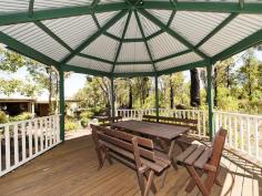  4415 Stoneville Road, Stoneville, WA, 6081	 Excellent value, this family home is sure to impress. As you meander down the driveway you cant help but feel you are about to enter your own little world of privacy with the peaceful feeling of being out in the country & yet only 4.5km's from central Mundaring. The north facing, quality built, architect designed brick & Iron home boasts 300sqm of living space. Inside the first thing you notice is the soaring ceilings. The kitchen is perfect for those large family gatherings with heaps of benchspace, lots of cupboards plus a walk-in pantry that has its own workbench. There is also a new 'Emelia' 80cm Upright Cooker, dishwasher and large fridge/freezer recess. 