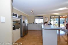  7 Tulga Court, Dawesville WA 6211 This property is a family paradise and country living at its best. On a 2106sqm elevated site the property boasts a huge man shed at approx 10 x 12 m with 3 phase power and its own reinforced mesh drive way. Full reticulation with bore. The house boasts four generous sized rooms and 2 bathrooms. Beautiful spa bath in the ensuite and a walk in robe. The Alfresco has a view of the sea and the kitchen and living flows out to the Alfresco. A kids play house completes the picture of sublime country living. Get some chooks and live the good life. - See more at: http://www.estuaryrealty.com.au/real-estate/property/744936/for-sale/house/wa/dawesville-6211/7-tulga-court/#sthash.cM0DYmhy.dpuf 