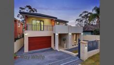  5 Duntroon Ave Epping NSW 2121 New, truly sumptuous, architecturally designed home, ideally positioned on a level parcel of land in the midst of leafy Epping, close to all amenities & appreciating a low maintenance garden with verdant surrounds. A large, generously proportioned home comprising five double sized bedrooms plus a fully contained two bedroom apartment within the home itself. Luxury inclusions such as high quality amenities, double glazed windows to ensure peace and temperature control along with a fully ducted air conditioning system throughout the home, while alfresco dining is ensured with a covered adjoining entertaining area. The home flows over two levels and is ideally suited for the largest of families and those with extended family, and has been designed to please the most demanding of buyers. Stroll to public transport, approx. 300m walk to Epping West Public School & within the catchment for excellent primary & secondary schools. 