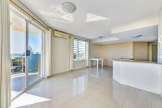 Unit 15/5 Whalley Street Bargara Qld 4670 This unit boasts enviable ocean views from the living area and balcony out over the swimming pool deck and central Bargara township. Fourth floor two bedroom apartment with a North and North East aspect over the coastline. The open living / dining area is tiled and air-conditioned. Adjoining is the attractive kitchen with Cesar Stone bench tops, ample cupboard storage, pantry, electric cooktop, under-bench stove and large refrigerator space. The main bedroom has good coastal views, carpet, is air-conditioned, has a built-in robe and en-suite bathroom 