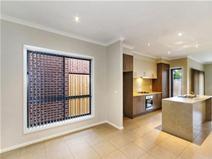 2/4 Rowson Grove Clarinda VIC 3169 MODERN SPACIOUS AND WELL LOCATED Contact Agent Located in a quiet street with only a short walk to Clayton road and Clarinda Shopping Centre this Near new Townhouse with popular street frontage offers all the Comforts and Luxuries expected from a Top Quality Property. The lower level features generous Open Plan Living including a Superb Kitchen, Dining area, Study, Laundry and Powder room plus access to an easy care Courtyard Garden. Upstairs features 3 spacious Bedrooms with a Full En-suite to the Master Bedroom plus a Family Bathroom and a separate Toilet. • Kitchen with S/S Appliances inc. Dishwasher • 2 Split System Air Conditioners • 2 Dining areas • Internal access to Garage (Remote Control Door) • En-suite, Fam.Bathroom and Powder room. • Full size Laundry • Rear Courtyard with Water Tank and Garden Shed. For Further details and Inspections Contact Robert on 0403-346060