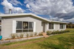  6 Tongbong Rd Rylstone NSW 2849 Renovated with French country style, this four bedroom home is situated on a gently sloping one acre block on the the banks of the Cudgegong River. Sit on your rear deck and see if you can spot the platypus bobbing about in the river below, or feast your eyes on the panoramic view of the Rylstone township with it's picture perfect charm. The home comprises a generous lounge room that flows into a charming eat in kitchen with ample pantry and bench space. The four bedrooms are well sized and have built in robes. The modern bathroom has separate bath and shower.  The entire home is flooded with natural light and is kept cosy with an extremely efficient wood heater, and cooled with air conditioning in summer. A covered outdoor entertaining area is protected from the elements with cafe blinds when needed, and there's plenty of storage for cars and toys in the double lock up garage and garden shed. 