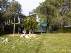  2 Loton Rd  Dawesville WA 6211 Be sure not to miss this well-priced property in a great location! Why not start your day, every day, to the hidden treasure of Dawesville, with the estuary shores just a short stroll and a boat ramp nearby, you could either demolish the existing house or create your home out of this humble abode.  The two bedroom one bathroom holiday home has a large decked area offering views of the estuary with the backdrop of the distant hills and is on a 818m2 block and offers plenty of room for the boat, plenty of parking for the cars and under cover parking for boat or caravan.  Whether you’re looking for the holiday retreat, for the weekends or summer holidays this area is an ideal location for a holiday property or build your own dream home just the way you want it! 