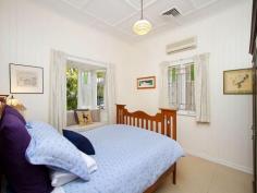 35 Woodrow Dr Coorparoo QLD 4151 Perfect as is....but packed with possibilities! In
 one of Coorparoo's premier locations, sheltered by towering palm trees,
 rests this gorgeous original Queenslander. Faithfully restored and 
maintained by its current owners (only the second in its 90 year 
history!) the residence and its vast block are a 'must-see' for those 
seeking a timeless home with plenty of room to grow. Rich in 
original features, including 11ft VJ walls, stained glass windows, 
decorative fretwork and traditional lights, its old-world charm has been
 skilfully preserved. Yet, modern updates in the kitchen, bathroom and 
home's structure ensure comfortable and low-maintenance living. 
Specifically, the property now boasts ducted air-conditioning 
throughout, stainless steel Smeg kitchen appliances as well as new 
plumbing, roof and electrics. Offering perfect spaces for today's
 growing family there are also endless possibilities for the future. The
 spacious living areas lead through French doors onto the expansive 
covered rear deck. A delightful place to entertain, this resort-style 
outdoor area overlooks an enormous, fully-fenced garden and patio, where
 the kids (existing or planned!) can ride bikes, play and explore. 
Meanwhile, you can sip drinks at the deck's bar while chatting freely 
with the resident 'chef' through the bi-fold kitchen windows! The upper 
and lower outdoor areas are conveniently linked by a staircase; an ideal
 inclusion should full advantage be taken of the huge yard, and a 
swimming pool constructed. Three good sized bedrooms (one with 
built-in-robe) are serviced by a central bathroom featuring claw-foot 
bathtub and a separate toilet. The third bedroom could equally function 
as a home office with convenient entrance at the front of the home. But,
 should more rooms be desired, the 744sqm block and layout of the 
residence offer significant potential to remodel, extend the home's 
footprint on the existing level or raise and build in underneath. Located
 in a highly sought-after street, surrounded by million-dollar homes, 
investment in this address would be an investment in the future! And the
 lifestyle accompanying this locale has seen it become exceptionally 
popular for families and professionals alike. It is just 5km from the 
CBD, a short walk to Coorparoo railway station, on the doorstep of 
Wembley Park with access to walking and riding tracks, and within close 
proximity of private and state schools, shopping amenities and 
café/dining precincts. The owners have loved and nurtured this 
traditional home for nearly two decades. But now, with an interstate 
move fast approaching, their instructions are clear.. It must be sold! 
Seize the opportunity and inspect now!   Property Snapshot Property Type: House Construction: Weatherboard Zoning: Inner Residential Land Area: 744 m2 Features: Air-Conditioner in Main Bed Airconditioned Built In/s Close to Parks Close to Schools Close to Shops Close to Transport Deck Dining Room Dishwasher Established Gardens Fenced Back Yard Fenced Front Yard Garden Shed Gas Hot Water Gas Stove Hardwood Timber Floors Lock Up Garage Lounge Room Outdoor Entertaining Quiet Street Renovated Separate Toilet Spacious Stainless Steel Appliances Storage Study Suburban Views Sunroom Undercover Entertainment Area Water Tank