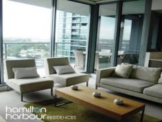 10701 8 Harbour Rd
HAMILTON Qld 4007 This spacious 2 bedroom, seventh floor apartment overlooking Hamilton and Eagle Farm Race Track really does have it all. This floor plan has a beautiful open plan layout with large living and dining area that is accentuated by the double glazed floor to ceiling doors embracing the morning sun. The modern kitchen is equipped with European appliances - gas cook top, electric oven and dishwasher plus plenty of bench and cupboard space has direct access to the balcony making it perfect for dining and entertaining with ease. The master bedroom has a separate ensuite, with the second bedroom boasting views up the Brisbane River. Both of which are queen sized. The laundry is cleverly hidden behind closed doors and the main bathroom includes a bath tub for complete relaxation. This is a Pet friendly complex. Located in the hub of the Hamilton Harbour Precinct and 3 minutes walk to Racecourse Rd Village, Brett's Wharf and Portside, you will be in the centre of all the local dining, entertainment, shopping, medical and community services. Close to a variety of public transport options including the BCC City-cat and ferries, trains, bus stops, airports and arterial roads, going places is a breeze. 