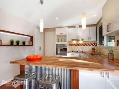  1/23 Waratah Ave The Basin VIC 3154 Easy Living, Sophisticated Interiors and a Resort-Like Ambience A
 quiet and idyllic setting, lush landscaped gardens and a modern entry 
make for an arresting first impression and set the scene aptly for the 
polished, newly renovated interiors within this impressive home. Downsizers
 and first homebuyers alike will be delighted by the myriad of chic 
touches and modern, functional appointments lavishly featured throughout
 this desirable abode. Vogue wall niches and floating floorboards 
enhance the inviting living area, and extend into a sizeable meals space
 overseen by the striking gourmet kitchen appointed with timber 
surfaces, mini orb accents, striking feature tiling, clever storage 
solutions and stainless-steel appliances. Three plushly carpeted 
bedrooms; two with mirrored robes including the master bedroom enjoying 
en suite-effect to the stunning bathroom boasting exquisite mosaic glass
 tiling, a separate bathtub, modern vanity and shower with rainfall 
showerhead. For those who love to entertain; French doors open out
 from the dining zone to a glorious deck sheltered under a gabled roof; 
vast in size and aesthetically pleasing with sunken rainforest-like 
gardens adding to the tropical, resort-like ambience, providing a 
secluded and tranquil place to dine alfresco or just enjoy. Notable
 benefits include ducted heating, a separate toilet and fitted laundry, 
storage shed, water tank and double garage on remote with access to the 
tidy courtyard. Positioned in the heart of The Basin, just a short
 distance to local village shopping and Alchester Shopping Centre, a 
choice of parklands, reserves and walking trails through the Ranges, 
highly regarded schools, bus transport and a close proximity to Boronia 
amenities. A home of low-maintenance ease, enviable interiors and 
comforts and an irresistible locale, what more could you need or want? 
Enquire today! Photo ID Required 