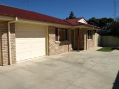  3/15-17 Fisher Street, Clifton Qld 4361 Walk 150 metres to the supermarket and the local hotel from this near new spacious unit in Clifton. The complex of 4 is well designed with remote garage and storage built above the garage. The concrete drive covers most of the driveway of the back unit area and there is a private grassed courtyard that has an established fernery and gardens along a paved walkway. The back patio is refreshing to sit under and relax with a book or have breakfast and lunch in the privacy of the fenced in yard. The bathroom is two way from the main bedroom and the hall, the second bedroom is double and the office could be a third bedroom or office. There is a second toilet and basin for visitors in the hallway. - See more at: http://www.cliftonrealestate.com.au/listings/residential_sale-168834-clifton/#sthash.no4H9Hqx.dpuf 