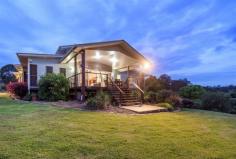  416 Laurel Rd North Deep Creek QLD 4570 Privately positioned on 40 peaceful useable acres on the east side, just 10 minutes from Gympie's CBD, this immaculate residence is generously proportioned and unsurpassed in style and finish. Filled with natural light, it offers an effortlessly flowing indoor/outdoor layout with an idyllic outlook across the sweeping land. Whilst the home has air conditioning throughout, fans and clever positioning of windows, allow for cross ventilation with breezes to cool the home during the summer months. The open plan living areas include casual living, formal lounge and dining which are all central to the gourmet kitchen. The master suite has a chic ensuite plus stylish walk-in robe, while the other bedrooms each have built-ins. With massive expanses of glass allowing unobstructed views to the mountains beyond you step out to the large covered outdoor entertainment area to get even better access to the views and kick back with a drink while you and your guests soak in the serenity - See more at: http://www.landmarkharcourts.com.au/Property/582874/QGM8438/416-Laurel-Road#sthash.zcwJRxcV.dpuf 