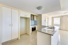 Unit 15/5 Whalley Street Bargara Qld 4670 This unit boasts enviable ocean views from the living area and balcony out over the swimming pool deck and central Bargara township. Fourth floor two bedroom apartment with a North and North East aspect over the coastline. The open living / dining area is tiled and air-conditioned. Adjoining is the attractive kitchen with Cesar Stone bench tops, ample cupboard storage, pantry, electric cooktop, under-bench stove and large refrigerator space. The main bedroom has good coastal views, carpet, is air-conditioned, has a built-in robe and en-suite bathroom 