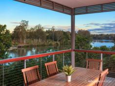  30 Sonanne Pl Fig Tree Pocket QLD 4069 Grand river views that encapsulate both a wide expanse of water and the 
verdant beauty of Sherwood Forest Park provide a fittingly dynamic 
backdrop to this immaculately presented and very private flood free 
near-new home. 
 
Sophisticated and elegant, comprehensive design elements are proudly on 
show throughout the entire property, with all rooms oriented Northeast 
and of generous proportion. Great attention has also been paid to 
creating an abundance of natural light while still maintaining total 
privacy. This has been achieved through the use of dense boundary 
hedging, a proliferation of well-positioned windows and the utilisation 
of courtyard gardens.The finishes also lend themselves to a quiet 
sophistication, with Spotted Gum hardwood flooring and sealed Travertine
 used extensively throughout, along with Caesarstone, stainless steel 
and glass. All these elements come together in the open plan living 
space, where a dynamic combination of design features not only provide a
 highly functional area to live and entertain but also an impressive 
visual scene, thanks largely to an entire wall of glass that fully 
encapsulates the river views. 