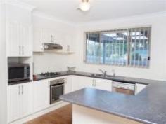  Willow Vale   NSW   2575 Take a closer look at this deceptively spacious home with an adjoining flat. Situated on a large 1393m2 block the main residence offers three bedrooms, built in robes, ensuite to main, formal lounge, whilst the attractive kitchen adjoins the dining area and very spacious family room. The adjoining flat comprises a spacious lounge / dining and kitchen, bedroom, two way bathroom and sunroom, plus a private deck overlooking the rear yard. Car accommodation includes a double garage and a second freestanding double garage. Your inspection is highly recommended. 