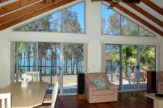  88 Coomba Rd Coomba Park NSW 2428 'Waterfront Lakehouse' Located opposite Wallis Lake foreshore Park like reserve setting, full lake views Open plan floor plan with three bedrooms Detached garages for your boat and trailer Lake view front deck, quiet peaceful village Well maintained property, home or holidays! The 'Waterfront Lakehouse' is located in Coomba Park on the edge of Wallis Lake, and enjoys panoramic water views, spectacular sunsets and native wildlife can all be seen from inside the house and the balcony. Features:* Spacious lakeview living with vaulted ceilings* Two main bedrooms plus enclosed sunroom* Polished timber floors* A lakefront full width balcony* The property has been very well maintained* detached double LUG with carportFor more information, please contact Greg Hope on 02 6554 0666 and Mark Lawson on 02 6554 0600. 