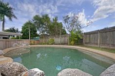  13 Talisman Close, Edmonton QLD 4869 TREMENDOUSLY GREAT VALUE Offers around $300,000.00 This tremendously great valued home, situated at the end of a very quiet cul-de sac, on almost the old quarter acre block, 965m2, will certainly tick one of the families most sought after requirements, “enough back yard space for the kids to play”. With block sizes in new estates, decreasing every new release, houses on good sized blocks like this one, will become, very much a sought after asset in time to come. Some of the many features include……… -	4 Bedrooms, 2 Bathrooms -	Family room/Lounge room -	Great under cover entertaining area -	Nice in ground pool to cool off on those steamy hot days -	Rear access to the back yard The home is well worth your attention and the owners are extremely motivated to achieve a quick sale, a win, win situation for everyone. So don’t delay, call Grant today for any additional questions or to arrange a private inspection.  