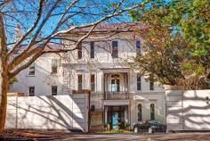  2 Macleay St Potts Point NSW 2011 One Of Sydney’s Most Significant Mansions On Approx 1,970 Sqm of Elite Harbourside Land North-East facing on a vast parcel of park-like land, this magnificent Regency Revival family estate is beyond breathtaking from the first impression to the last. Fastidiously restored and perfect for luxurious modern indoor/outdoor living, this heritage listed private holding was originally designed by celebrated colonial architect Edmund Blacket c.1868. The home was once occupied by King George V while he was serving in the Royal Navy.  Capturing panoramic views across the Harbour to the Heads, the versatile floorplan offers regal proportions and a uniquely rich ambience of sun-splashed tranquility.  - Level entrance, 600sqm secure forecourt garden with gate-house, circular driveway, multiple parking - Splendid portico, colonnaded entrance foyer, separate cloak room, marble guest powder room - Drawing room, bay-fronted separate huge living room opens to superb verandah & large alfresco deck - Large breakfast room and open plan contemporary commercial-grade masterchef kitchen with marble island, custom-built stainless steel benchtops and cupboards, Italian gas stove/double oven, char-grill, teppanyaki grill, plate warmer, pasta maker, dishwasher, 3 sinks, ice maker, wine fridge, ample storage - Enormous circular main outdoor entertaining garden with north-east facing sundrenched level lawns - Sitting room or gym or guest room (with store room) also opens to barbeque deck and vast private garden - Informal level access via 2nd entrance foyer with a separate larder/walk-in pantry or wine cellar - Banquet sized formal dining room with a juliette balcony and a separate butlers pantry - 5 palatial bedrooms with stunning marble ensuite bathrooms (heated floors), his & her walk-in robes - Upstairs sitting area with balcony, separate study/office or 6th bedroom, internal laundry/utility room - 10 Marble fireplaces, grand cedar staircase, custom cabinetry, inlaid parquetry floors, kauri timber floors - Majestic combination of marble, glass, soaring 4m ceilings, classic cast-iron columns & lacy balconies - Sandstone walled separate large basement workshop, dungeon-style store room and extensive cellars Unrivalled in all that it offers, Jenner House is a distinguished family home in an exclusive harbourside location, convenient to chic cafes, cosmopolitan shopping, transport choices, idyllic parks, fine dining at The Wharf and just minutes to the Sydney CBD. In conjunction with Michael Pallier 0417 371 522 Sydney Sothebys International Realty and Barry Goldman 0418 890 210 and Robert Page 0407 209 162 Raine & Horne Double Bay 