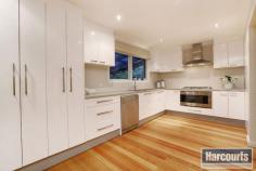  21 Hartington Dr Wantirna VIC 3152 Property Information Auction Date:Sunday 12 Oct 1:00 PM (On site)Open Home Dates:Saturday 20 Sep 11:00 AM - 11:30 AMSunday 21 Sep 11:00 AM - 11:30 AMBe swept away by contemporary design as you move through the glamorous ambience of this stylish showpiece. Professionally rendered in 'Dune', with hotel style polished porcelain bathrooms and a tropical style Merbau entertainment deck, this chic 4-bedroom home renovated with absolute attention to detail sets you up in an enviable position, just up the road from Templeton Primary. Walk up the new driveway, onto the large format tiled porch and through to magnificent hardwood floors, and you'll be enveloped by warm, inviting family living which flows around a grand galley kitchen, decked out for the resident Masterchef with a 90cm s/s oven, 5-burner cooktop, dishwasher and Blanco rangehood. Those 3 beautiful living spaces (lounge, family and meals areas) work seamlessly to provide a social and family friendly setting, which opens dramatically to a spectacular al fresco deck, perfect for entertaining. At the head of the home, the master bedroom is enhanced by a stunning striped porcelain tiled ensuite and fitted walk in robe, with a wall hung vanity, hob set bath and shower in the main bathroom, and fitted cupboards in the laundry. The inclusion of gas ducted heating, evaporative cooling, a 4-car garage for potential gym/training/home office, private fencing, solar panels and sophisticated feature walls offer a spectacular backdrop to family life in one of the most sought after areas in Wantirna, granting you VIP access to prestigious schools, Knox Shopping Centre and Eastlink. Land Size 	 800 sqm Property condition 	 Renovated Property Type 	 House House style 	 Contemporary Garaging / carparking 	 Double lock-up Construction 	 Brick veneer Roof 	 Concrete tile and Tile Flooring 	 Timber Heating / Cooling 	 Solar, Ducted, Other (Evaportaive Cooling) Property features 	 Smoke alarms Kitchen 	 Modern, Open plan, Dishwasher, Rangehood, Double sink, Pantry and Finished in Granite and Stainless steel Living area 	 Open plan Main bedroom 	 Double, Walk-in-robe and Heating / air conditioning Ensuite 	 Separate shower Bedroom 2 	 Double, Built-in / wardrobe and Heating / air conditioning Bedroom 3 	 Double, Built-in / wardrobe and Heating / air conditioning Bedroom 4 	 Double and Heating / air conditioning Additional rooms 	 Family Main bathroom 	 Bath, Separate shower, Heater Family Room 	 Heating / air conditioning Laundry 	 Separate Views 	 Private Outdoor living 	 Entertainment area (Covered), Deck / patio Fencing 	 Fully fenced Land contour 	 Flat Water heating 	 Gas Water supply 	 Town supply Sewerage 	 Mains Locality 	 Close to transport, Close to schools, Close to shops 