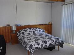  2 Tribe St Bicheno TAS 7215 Corner Position North facing residence close to the centre of Bicheno with dual access off both Burgess Street and Tribe Street into the carport. Two large double bedrooms both with built in wardrobes and carpet flooring, central passageway leads through to kitchen/dining and separate lounge area. Established garden with a number of trees for privacy from the street, some vegie beds, apple tree, garden shed and a workshop. Inspection is by appointment. 