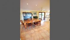 6 Hibiscus Avenue, Sapphire Beach NSW 2450 A Piece Of Paradise One You Will Be Proud To Call Home So privately positioned in quiet cul-de-sac within strolling distance to beautiful beaches, this spacious family home is designed for easy care living with quality tiled and timber floors throughout and spacious lounge, dining and family rooms all flowing out to the superb outdoor entertaining area complete with BBQ kitchen. All bedrooms have robes, are generous in size and ceiling fans throughout the home combined with gentle ocean breezes ensure your comfort during summer months, while the north easterly aspect will welcome the winter sun into the home. From the well equipped kitchen which is complete with gas cooking and dishwasher, you can enjoy a wonderful outlook to the serene rear garden and courtyard and whether your needs include a studio, a superb office to work from home or teenage retreat, the spacious studio with modern ensuite will cover all bases. Complete with inground pool, established gardens, bird aviaries, and workshop area with 4th bathroom, this family haven is a piece of paradise you will be proud to call home. 