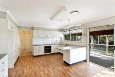  101 Kingswood Road, Engadine NSW 2233 Ideal for a young family, this single level brick home offers light filled interiors that flow effortlessly out to a large level child friendly yard. The interior features a great family friendly floorplan. All bedrooms are of a good size and include built-in robes. The bedrooms and generous lounge room enjoy brand new carpet and there is ducted air conditioning throughout. A main feature is the open plan kitchen and dining that flow out to an enclosed sunroom, all overlooking the level yard. Entertain your family and friends in the large outdoor entertainment area/pergola. Car accommodation includes double drive-through lock up garage and as an added bonus the pergola can be used as a double carport. Conveniently located close to local schools, parks, shops and transport, this property won't last long - be sure to inspect this one! 