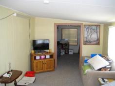 Site 71 The Anchorage Holiday Pk Iluka NSW 2466 SO YOU WANT VALUE FOR MONEY! Nestled
 in the very popular Anchorage Holiday Park, Iluka. NSW, only a stone’s 
throw from the mighty Clarence River, sits this compact and tidy mobile 
home. Consisting of 2 bedrooms, both carpeted and with built-ins 
and the 2nd bedroom having it’s own Air/Con unit, and the main bedroom 
adjacent to the tiled bathroom/toilet. A very tidy kitchen with gas 
stove, comfortable lounge /living area that opens on to a covered and 
fenced front verandah, an internal laundry and a large under cover 
garage with extra storeroom at the rear completes the under roof area. Park
 fees are $225 per fortnight, water costs around $14/month and 
electricity costs around $40/month, with the current owners. The 
property is connected to power, town water and sewerage and has a new 
gas hot water system. No contracts are required for this sale therefore there are no solicitors costs, however a Bill of Sale will need to be signed. The
 present owners are looking to move back to the bush for personal 
reasons, have already purchased their new home and are packing up now to
 move so the home will be vacant within the next 2 weeks – they are keen
 sellers. The Anchorage holiday Park is in a beaut position, has a 
friendly feel to it and suits the laid back lifestyle with Golf, Bowls 
and excellent fishing available to all who live in Iluka. Owners are asking only $90,000 for this home and are keen to sell – all offers will be looked at. Please contact either Ian Dunbar or Warren Tucker at Yamba Iluka Real Estate for an inspection of this property. Property:    House Bedrooms:    2 Bathrooms:    1 Parking:    1 Council:    Clarence Valley Council