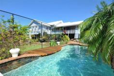  4 Kinmond Ave Wavell Heights QLD 4012 Property Information Tender Date:Tuesday 14 Oct 4:00 PMHighlighting the quintessential family lifestyle 'Nindethana' offers immense appeal to all who visit. Contemporary renovations blend with distinctive period character enhance this elegantly detailed home. Sweeping views to Moreton Bay from an elevated 1341 m2 sqm LMR corner parcel which captures those bay breezes. The home is light, spacious and superbly styled.  Notable features include: - Full sized north south grass tennis court - Beautiful fully fenced in-ground swimming pool - Generous accommodation with 3 bedrooms, master with ensuite and walk in robe surrounded by stunning leadlight windows - 3 very large bathrooms - Ducted reverse cycle air conditioning - Sunroom with north eastern views capturing those bay breezes - Large master chef kitchen with servery to large covered entertaining deck with views - Separate built in study - Additional rooms and amenities under for those weekend house guests - Formal dining room with timber door opening casual family rooms - Central hallway takes you to the bedrooms and bathrooms. - Family neighbourhood close to schools, transport and village shopping Private viewings available on request or call for viewing times. Land Size 	 1341 sqm Tenure 	 Freehold Property condition 	 Good Property Type 	 House House style 	 Colonial Garaging / carparking 	 Closed carport Construction 	 Timber Joinery 	 Timber Roof 	 Iron Walls / Interior 	 Timber Flooring 	 Carpet and Polished Kitchen 	 Open plan, Dishwasher, Separate cooktop, Rangehood, Extractor fan, Double sink, Waste disposal, Breakfast bar, Pantry and Finished in Timber Living area 	 Formal dining Main bedroom 	 King, Built-in-robe, Walk-in-robe and Ceiling fans Bedroom 3 	 Double and Built-in / wardrobe Bedroom 4 	 Double and Built-in / wardrobe Additional rooms 	 Family Main bathroom 	 Bath Laundry 	 Separate Workshop 	 Combined Aspect 	 North, East Outdoor living 	 Entertainment area (Covered), Pool (Inground and Concrete), Tennis court, Verandah Fencing 	 Partial Land contour 	 Flat Grounds 	 Manicured Water supply 	 Town supply Locality 	 Close to schools, Close to transport, Close to shops 