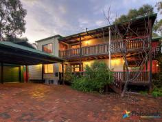  13 Toddy Pl Dunsborough WA 6281 BEACHY BROOME FEEL House - Property ID: 746139 Uniquely different & superbly located this stunning Old Dunsborough residence combines modern conveniences with Old World charm to create a truly magnificent property.  Nestled securely in a quiet cul-de-sac your privacy is ensured whilst also enabling you to enjoy the beautiful ocean views on offer from both levels of this sprawling home. Upon entering the home via the extensive wrap around verandahs, you are immediately captured by the attention to detail that sets this home apart from the ordinary. On the lower level the Jarrah floors flow seamlessly from the  2 bedrooms located at the front, right through to the master bedroom at the rear of the home with powder room, ensuite & spa. The generous living area has direct access to the front verandah, perfect for relaxing & enjoying the quiet & leafy gardens whilst lazing in the heated spa.  Upstairs the huge open plan design invites you into the main kitchen, living & dining area all climate controlled via the wood fire, gas fire & 2 reverse cycle air conditioners. Beautiful feature timber lined recessed ceilings, Jarrah flooring & windows complete the picture. The enormous country style kitchen with modern appliances & timber bench tops is the envy of any chef. A separated dining zone with ornate ceiling fan provides direct access & views out to the timber wrap around balcony & 180 degree ocean views beyond. The balcony sits amongst the treetops with plenty of space for outdoor entertaining. There is a 2nd large master bedroom also on this level with direct balcony access, bathroom & powder room for the guests  enabling you to reside on either level. Externally there is a double carport, covered boat stand, plus an approximate 6x6m powered shed, brick paved driveway & paths with easy maintenance lawns & gardens. This custom built residence has been lovingly created by the current owners to make the most of its desirable Coastal location just minutes to the Beach & Town Centre.   Print Brochure Email Alerts Features  Land Size Approx. - 896 m2  Built-In Wardrobes  Close to Schools  Close to Shops  Close to Transport  Fireplace(s) 