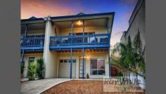  5 Geoffrey Ave Port Noarlunga SA 5167 The Perfect Coastal Low Maintenance Residence 
 This young and appealing home will
 delight those who wish to reside within walking distance to all of the 
facilities in the Port Noarlunga Township, offering the new owners a 
fabulous cosmopolitan lifestyle. The family friendly floor plan 
offers the space, design and functionality you're looking for and is set
 over two levels. Downstairs features two bedrooms, stunning main 
bathroom with shower, vanity and bath all in neutral warming tones, 
laundry and family room with easy access to the backyard. Upstairs
 comprises of master bedroom with wall to wall built in robe & 
stylish ensuite and a huge open plan kitchen, meals and living area, 
flowing to the entertaining balcony, all cleverly designed to capture 
those sensational views. The light and bright kitchen is very 
functional, and has an abundance of bench top space, drawers and 
storage, all complimented by stainless steel appliances including gas 
hotplate, wall oven, range hood and dishwasher. The warm comfortable 
feel provided by this home is accentuated by the floating timber floors 
that cover this entire area. This will become the hub of the homewhere 
all the parties begin..and maybe never end! Additional benefits include 
ducted & zoned reverse cycle air conditioning throughout, solar hot 
water system, secure pet run/enclosure and rain water tank. Set 
well back from the road on an elevated block of around 358sqm with 
plenty of off street parking including the single garage with automatic 
panel lift door & internal access. The front garden is easy care, 
while the back yard has been transformed into a Balinese inspired 
paradise. The beautiful merbau timber deck has been tiered and features a
 built in spa, LED lighting, bamboo screening and surrounded by low 
maintenance plants. Port Noarlunga is one of Adelaides best kept
 secrets, where a seaside lifestyle can be enjoyed, surrounded by cafes,
 a variety of restaurants and curios shops. For more information or 
inspection times, please contact Jackie Branden or Deb Sorensen of Ray 
White Port Noarlunga. 