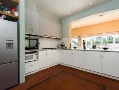  67 Minora Rd Dalkeith WA 6009 HOME OPEN SATURDAY 10 - 10.40AM!!! Spacious Family Home Originally built in 1937 - Huge extension and refurbished in 1996. Flexible design, many living areas, quiet street, close to parks, sporting facilities and river. Accommodation:  D/Stairs: Large cellar. Ground Floor: Entry hall, formal lounge, separate dining, study, games, kitchen/meals, family/sitting, laundry/shower, powder room, front verandah. U/Stairs: Master bedroom (with ensuite, separate WC, WIR, balcony and retreat), 4 more large bedrooms, bathroom with separate WC above celestorey. Features: 2 garden sheds, double carport, large north facing patio with vine covered pergola, landscaped gardens, north facing rear yard, lap pool, big window, fireplace, monitored security, reticulated grounds. Views of river from celestorey. 