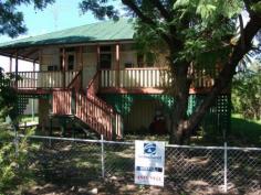 8 Taloom St Yelarbon QLD 4388 Live the quiet life in country Queensland! Good country town with all the essentials - General Store, Hotel, Post Office, State School, Police Station. 2 bedrooms plus office, high -set Queenslander on a large 2024 m2 double block. Large front deck to sit and enjoy the breeze while watching the world go by. Massive 18 m x 20 m lock up shed with 4.5 m awning. More than enough space to store all the cars, caravan and workshop tools. Yelarbon is a small rural town situated 45 km east of Goondiwindi on the Cunningham Highway, which is a major link between southern states to Brisbane. Contact Sloss & Co First National to arrange your inspection on 07 46711922     