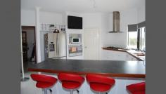  276 Gosnells Road East, Orange Grove, WA 6109 Do not miss out on this once in a life time opportunity. The owner had just dropped the price by $700,000. Due to unforeseen circumstances the owner must sell and we think this property is now defiantly the best valued property in the area. What do you get? 	2.01 ha pristine land overlooking the Jadran's Vineyard with the back-drop of the city of Perth as the block is one of the few elevated properties in the area! 	Near new 4 bedroom 2 bathroom home with twin A/C, built in wood fire, Spa entertainment room with city views, large office/study, Master bedroom fit for royalty, massive kitchen overlooking vineyard and city, solar power plus much much more!! 	The Icing on the Cake; A mammoth 301+ sqm concrete slabbed shed with entrance and exit built for the Truckie with mechanic pit power and a hell of a lot more. 