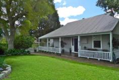  Mundaring1 WA, 6073 COLONIAL CHARM IN COOLGARDIE STREET Built in the early 1900's this character cottage has it all wide floorboards, pressed tin ceilings, sash windows and original Oregon doors. Within walking distance of the centre of Mundaring, it now comprises 4 bedrooms, one of which started its life as the old Coolgardie Post Office, a big lounge and renovated kitchen/dining area. Features include; 1800m2 fully fenced block Weatherboard character cottage 4 bedrooms or 3 plus study Renovated bathroom New kitchen and appliances R/c air conditioning  Open fire in lounge room Wide floorboards, sash windows & Oregon doors Solar Hot Water System Powered workshop/shed with cellar underneath Several smaller sheds and chook run Established fruit trees Freshly painted, clean and bright throughout this is a rare opportunity to purchase a delightfully renovated character home in the heart of Mundaring.  Inspection will not disappoint. Call Nancy 0418 949 959 for more details or an inspection Other features: Built-In Wardrobes,Close to Schools,Close to Shops,Close to Transport,Fireplace(s) 