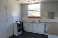  21/23 Sophia St Tullah TAS 7321 Property Information Situated in the lakeside town of Tullah this beautiful property offers everything. Freshly renovated two bedroom with separate lounge and open dining/kitchen area. New carpets, fresh paintwork, new roof, upgraded meter box and modern updates. Tastefully set on large block of 1151sqm. Plenty of room for the boat, caravan and cars. Also on the block is a large fully lined shed with glass sliding doors and electric wall heating. Easily converted into additional living area or large family rumpus and office. The block is fully fenced and receives plenty of sunlight for sitting to enjoy the views of Mt Murchison and Mount Farrell. Call to discuss further or to arrange inspection. Land Size 	 1151 sqm Approx year built 	 1975 Property condition 	 Renovated Property Type 	 House House style 	 Bungalow Garaging / carparking 	 Off street Construction 	 Cladding Joinery 	 Aluminium Roof 	 Iron Insulation 	 Ceiling Walls / Interior 	 Panel sheeting Flooring 	 Carpet and Other (Vinyl) Heating / Cooling 	 Electric Property features 	 Smoke alarms Chattels remaining 	 Electric wall heater, Fixed floor coverings, Light fittings, Stove, TV aerial Kitchen 	 Standard, Open plan, Upright stove, Extractor fan and Pantry Living area 	 Separate dining, Separate living Main bedroom 	 Double and Built-in-robe Bedroom 2 	 Double and Built-in / wardrobe Additional rooms 	 Rumpus (Heating / air conditioning) Main bathroom 	 Bath, Separate shower Laundry 	 Separate Views 	 Urban Aspect 	 South Outdoor living 	 Entertainment area (Covered) Fencing 	 Fully fenced Land contour 	 Flat Grounds 	 Tidy Water heating 	 Electric Water supply 	 Town supply Sewerage 	 Mains 