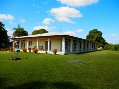  261 SEXTON Highway Brandon  Qld 4808 Quality block home, with machinery sheds, on 9210 sqr mtr block. - Quality block, 2 year old home (over 400 sqr mtrs). - Quality tiles, fully airconditioned.  - Brilliant Tassie Oak kitchen. - 3 large bedrooms + office or 4th bedroom. - Verandahs on all 4 sides. - Machinery sheds (15 bays) with accommodation (suitable for harvester & haulouts). - Situated on the edge of town. A copy of the Sustainability Declaration is available for viewing at our office. - See more at: http://www.landmarkharcourts.com.au/Property/582821/LTY2946/261-Sexton-Highway#sthash.hnFawxJj.dpuf 