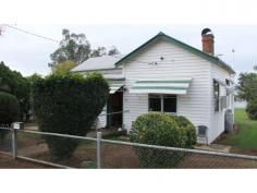  208 Bloomfield St Gunnedah NSW 2380 This weatherboard home only minutes from the main street of town makes for an ideal miner’s cottage for those commuting to the northwest coal fields – an affordable buy with potential to develop in years to come. Current zoning is R3 medium residential density on 1,012sqm block. Gas heater to warm the living space, kitchen, bathroom and internal laundry. Large rear utility room or workshop with concrete floor for all your tools and equipment. Air conditioning in spacious main bedroom and additional two rooms for storage or sleepouts. Please contact Agent for inspection. - See more at: http://www.ewingrealestate.com.au/listings/residential_sale-226191-gunnedah/#sthash.UglJ1g5h.dpuf 