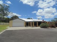  21 Roberts Road COOROY Qld 4563 GREAT YARD FOR LANDSCAPERS....  Approx 9 yr old 4 bedroom, 2 bathroom rendered brick home  Formal lounge and dining, gas stove top  3 Daikin reverse cycle air conditioners, fans throughout  Gas connection in kitchen and entertainment area  Fully enclosed outdoor entertainment area  3kw solar system/gas hot water  9m x 18m shed with shower & toilet, 3 phase power  7m x 7m colour bond shed with power  2 colour bond dog kennels with 2 metre high fencing  Full dog proof fencing, fenced into to 4 separate areas  2 x 4 metre electric entrance gates  Bitumen & concrete driveway to house & shed  Approx 70 fruit trees fully irrigated  1.08ha (just over 2.5acres) 