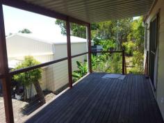  55 Wirralee St Macleay Island QLD 4184 This tidy two bedroom home also has a workable study which could always be used as a third bedroom. The house will surprise and delight you when you walk in the door. A highset home with a bushland view near the water in a quiet no through road. Underneath the property is build to legal height so it would be possible to extend downstairs at a later date. 